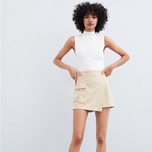 FAUX SUEDE BEIGE ASYMMETRICAL SKORT WITH POCKET